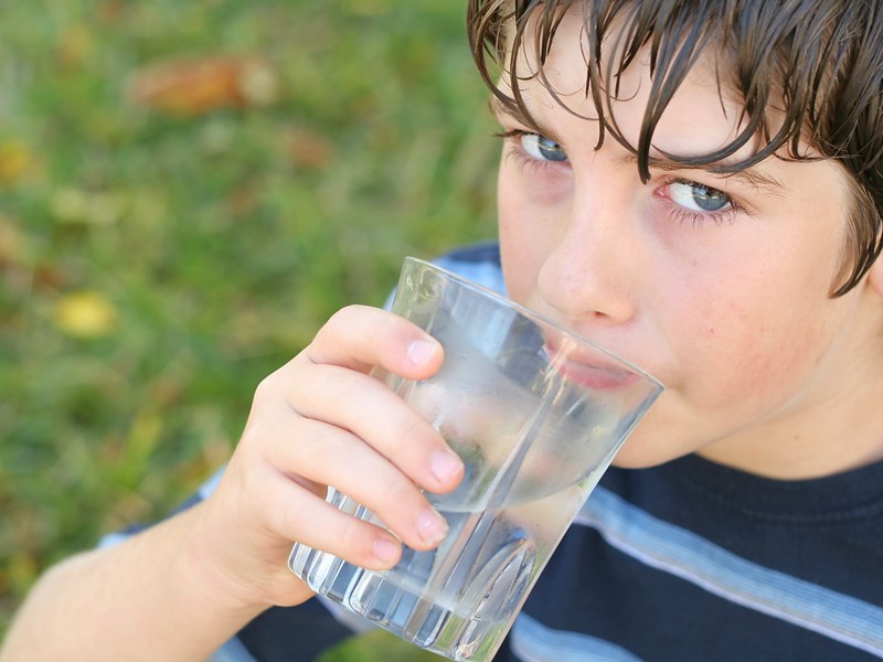 Boy drinking water