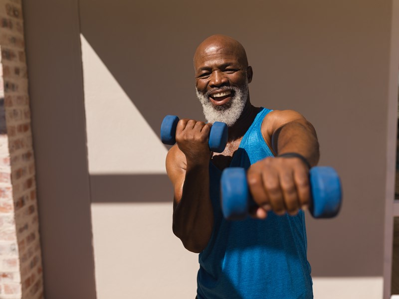 Man exercising with hand weights