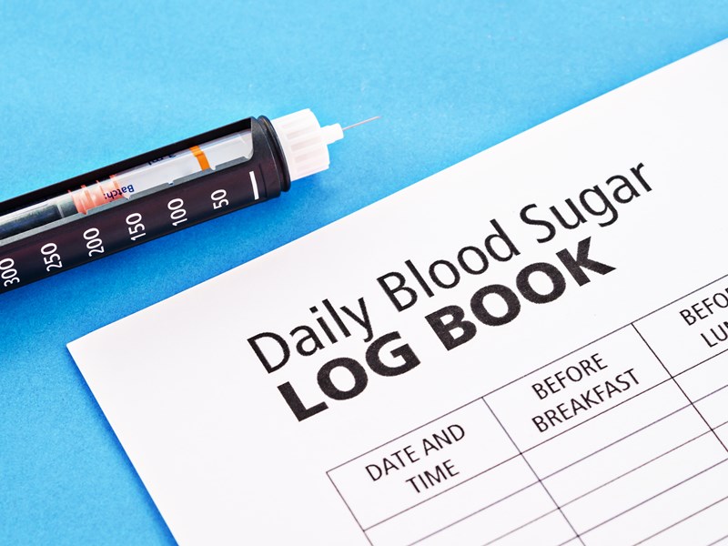 Syringe and blood sugar log book