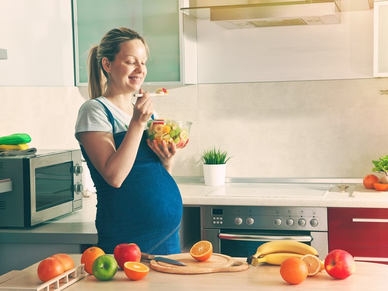 Pregnant woman in kitchen