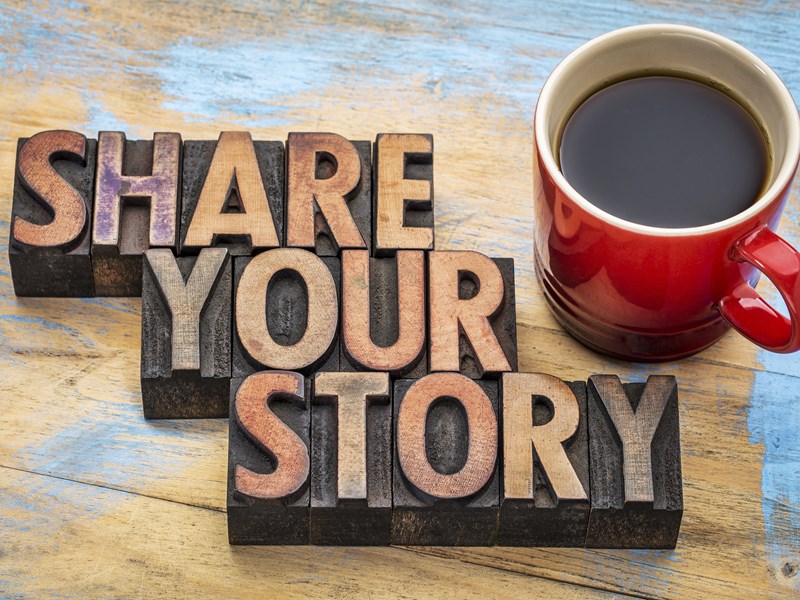 'share your story' next to red mug