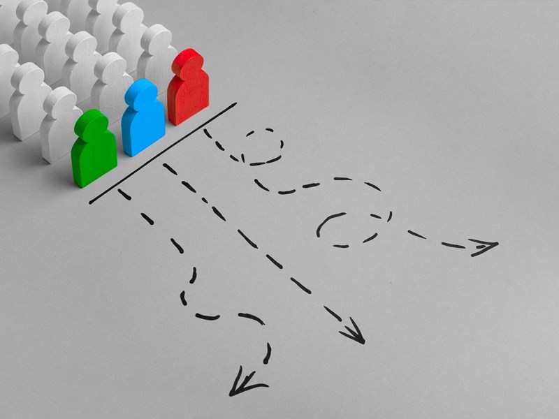 Figures with different journey paths drawn out